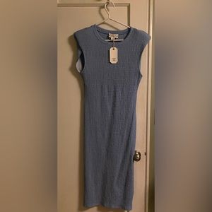 Size medium Vici light blue stretchy dress, never worn with tags.